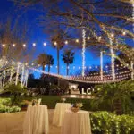 Three cocktail tables with white table covers