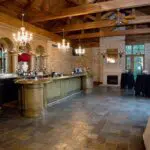 Three chandeliers in the kitchen counter area