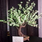 A stunning LED lighted tree on display at a convention.