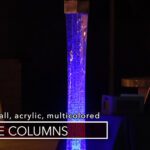 An acrylic LED bubble column featuring a blue light in the middle.