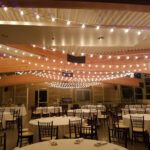 A Springs Preserve Las Vegas banquet hall adorned with elegant string lights.