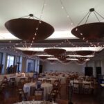 A large room at Paiute Las Vegas adorned with string lights, perfect for event lighting.