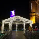 A pavilion covered with lights