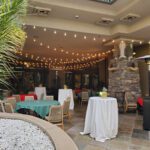 An expansive outdoor space featuring tables and chairs for your event at CiliLake Las Vegas.