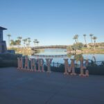 A beautifully lit sign that says "Marry Me" in front of the serene Westin Lake Las Vegas.