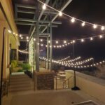 Enhance your outdoor gathering at Paiute Las Vegas with stunning string lights hanging from the patio ceiling, creating a magical ambiance for your event.