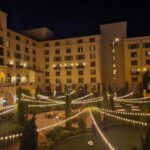 Event Lighting at a hotel courtyard at night with string lights.