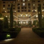 The beautifully lit courtyard of Hilton Lake Las Vegas, adorned with mesmerizing string lights.