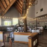 An elegant banquet room at Mt Charleston Las Vegas adorned with stunning string lights, providing the perfect ambiance for events and gatherings.