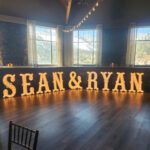 Sean & Ryan's wedding featured beautiful event lighting at Mt Charleston, Las Vegas.