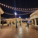 Event Lighting at night in a shopping plaza.