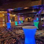 Specialty lighted tables in the lobby of a hotel.