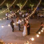 Event Lighting at a wedding reception with string lights in the background at Springs Preserve Las Vegas.