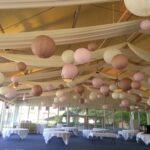 Event Lighting at Hilton Lake Las Vegas featuring a large tent adorned with paper lanterns for a magical ambiance.