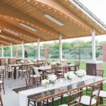 An outdoor wedding reception set up with tables and chairs at LDS Church Las Vegas.