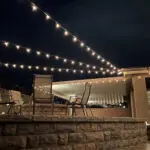 A patio with string lights, offering a long-term lighting solution for outdoor spaces in Las Vegas.