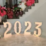 2022 marquee letter rental and lighted numbers on a staircase.