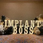 Implant boss marquee letters